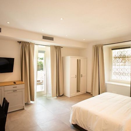 Alpencity Suites Trento Bagian luar foto