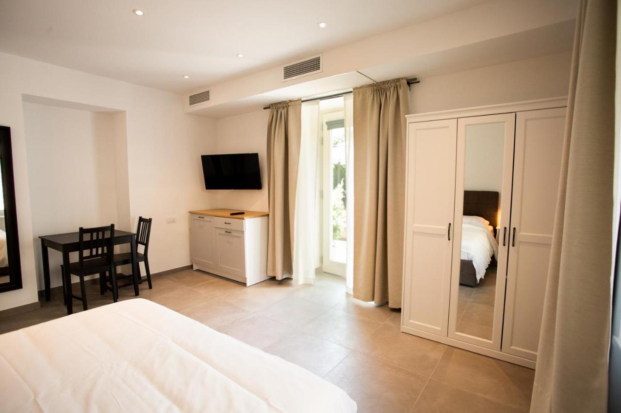 Alpencity Suites Trento Bagian luar foto