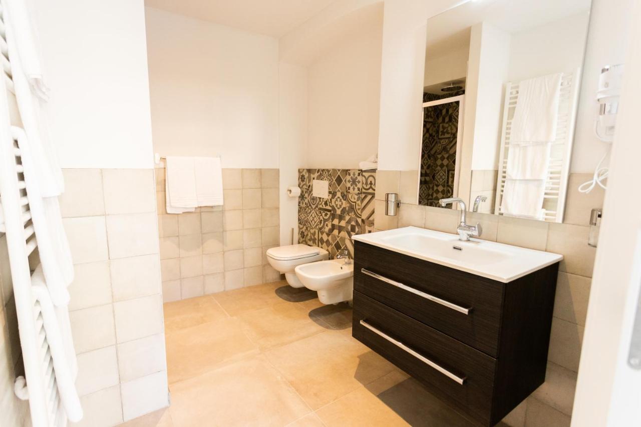 Alpencity Suites Trento Bagian luar foto