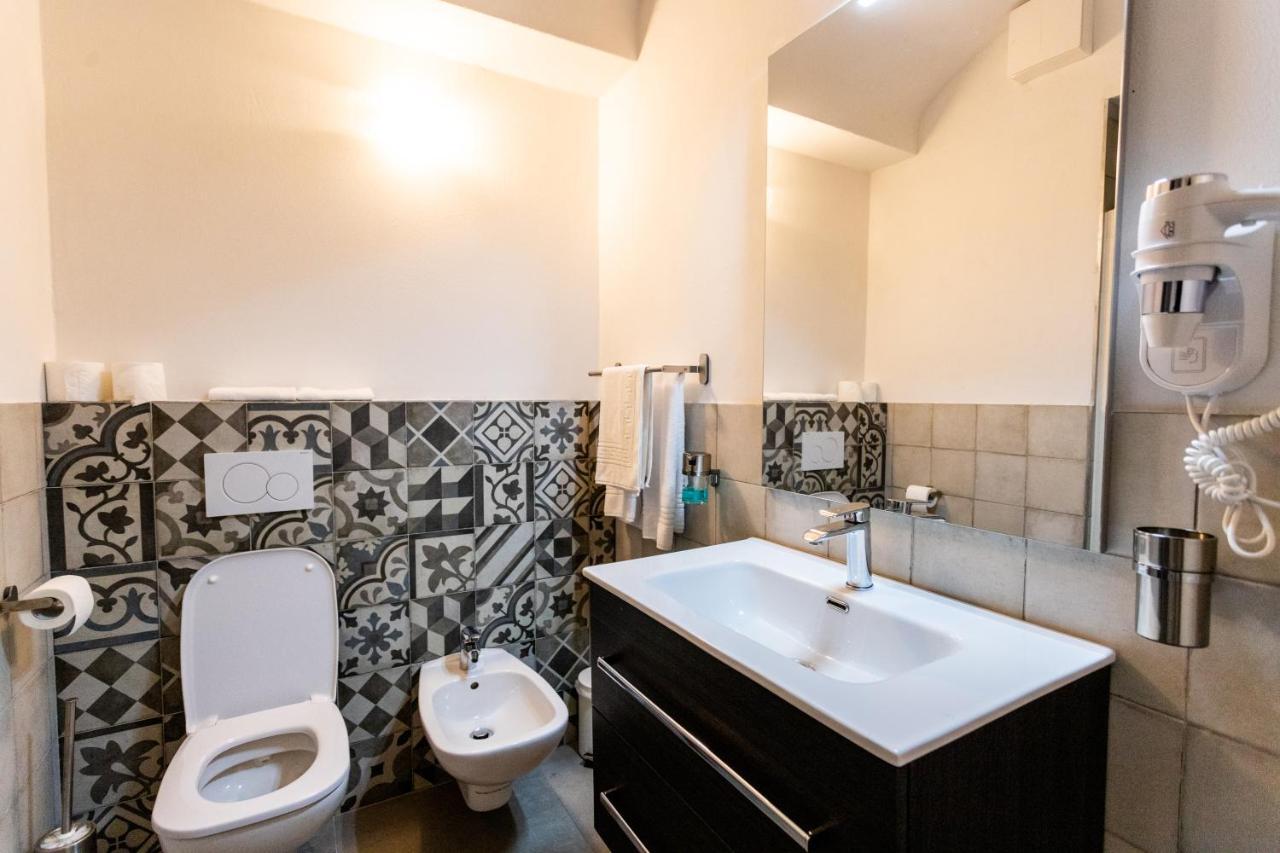 Alpencity Suites Trento Bagian luar foto