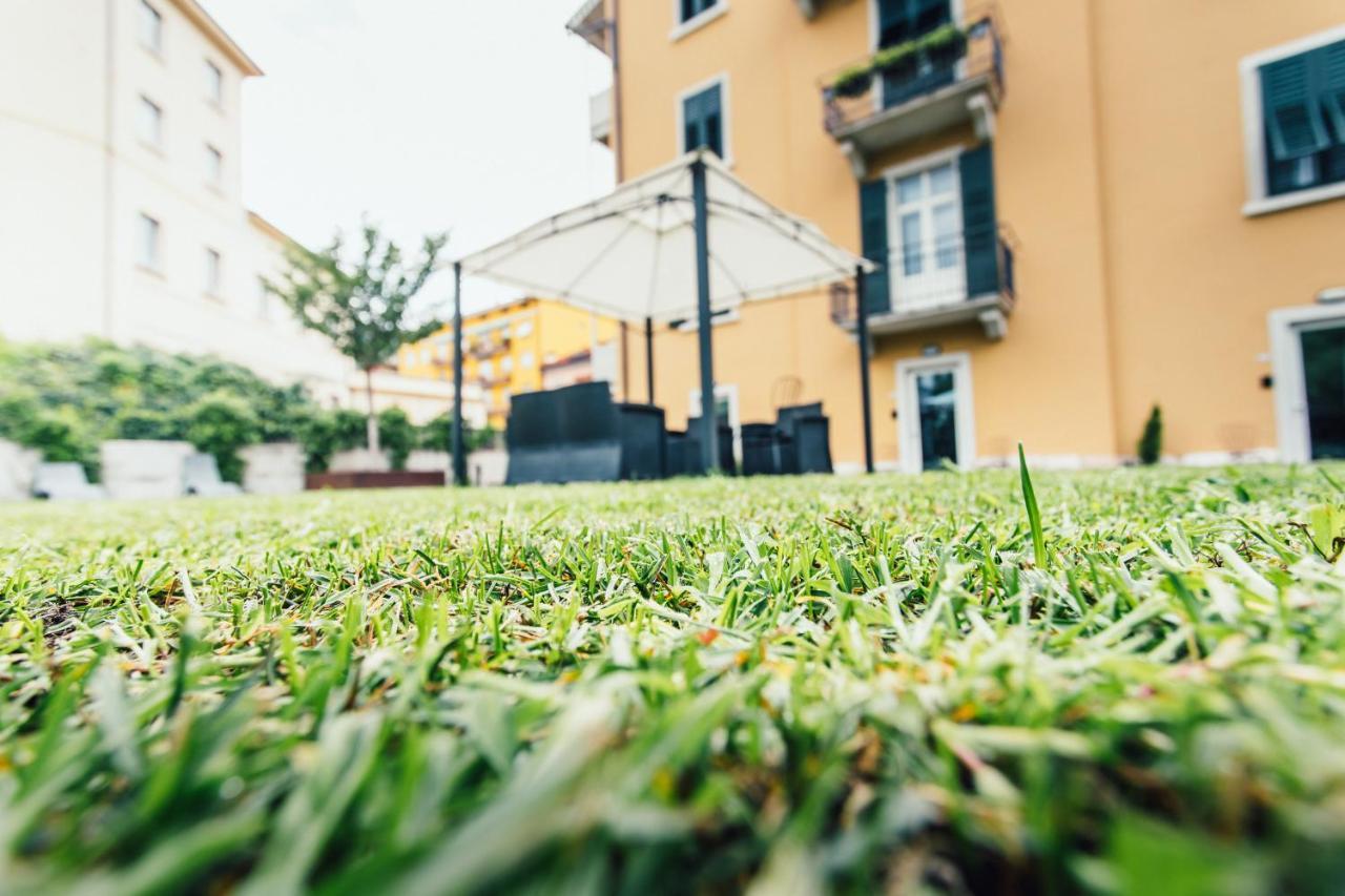 Alpencity Suites Trento Bagian luar foto
